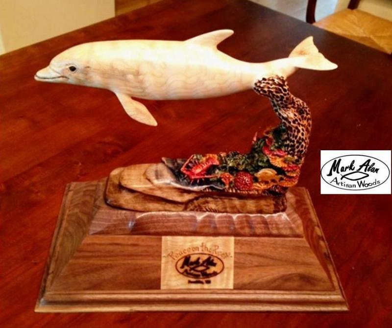 Dolphin sculpture "peace on the reef"